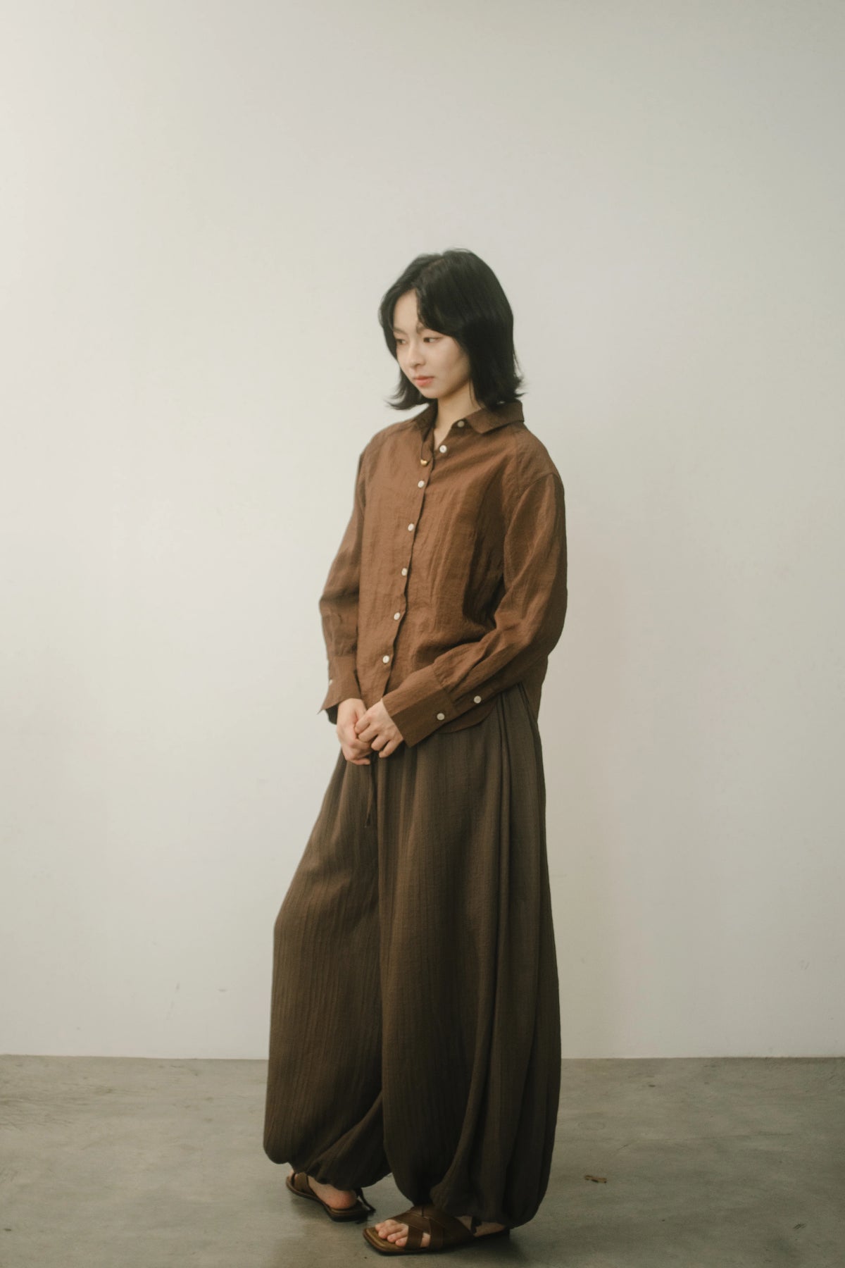 WES x GUNG x SO | Easy Shimmer U-Hem Blouse (Brown)