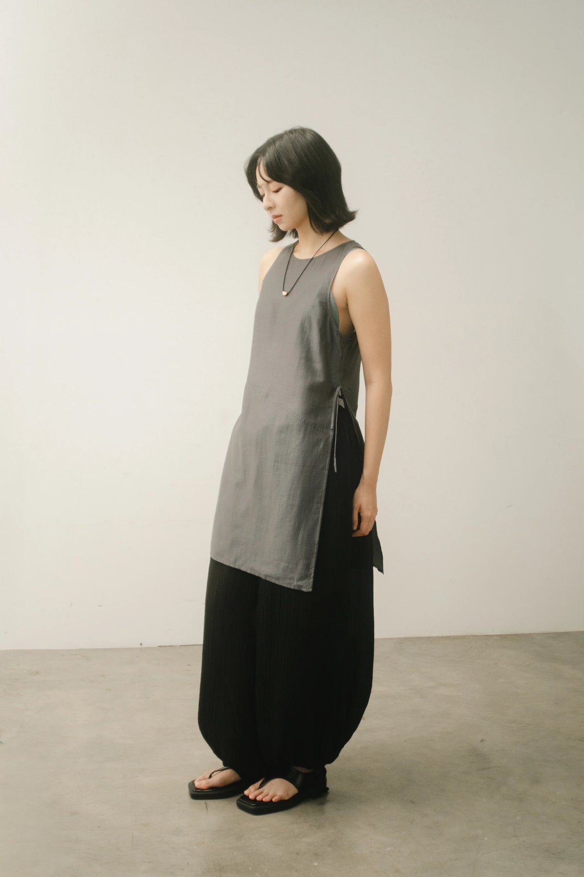 WES x GUNG x SO | Bold Side Slit Long Tank Top (Dark Grey)
