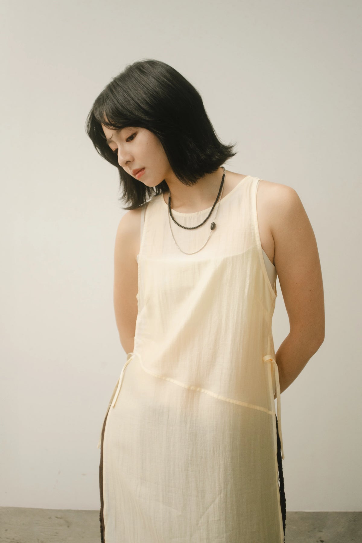WES x GUNG x SO | Bold Side Slit Long Tank Top (Butter)