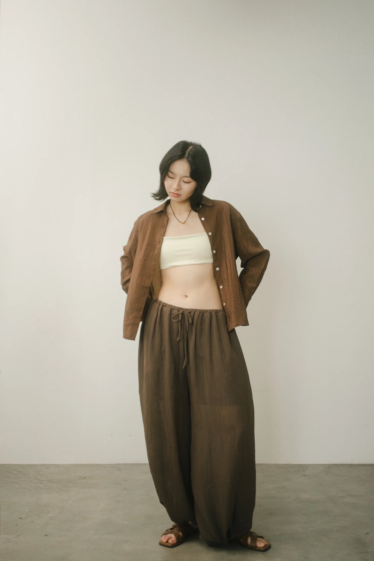 WES x GUNG x SO | Easy Shimmer U-Hem Blouse (Brown)