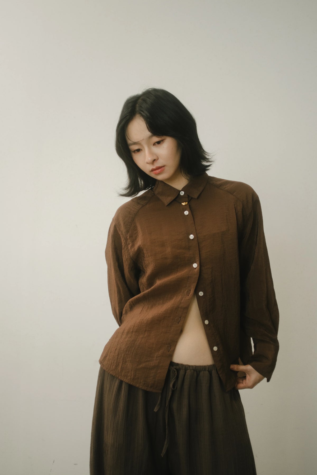 WES x GUNG x SO | Easy Shimmer U-Hem Blouse (Brown)